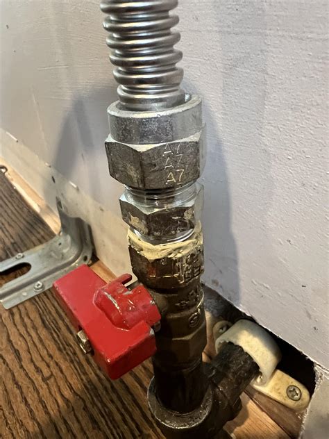 disconnecting gas line to stove